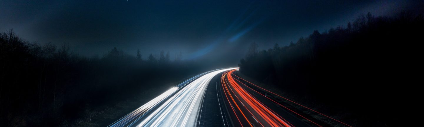 light-trails-on-highway-at-night-315938-1440x432